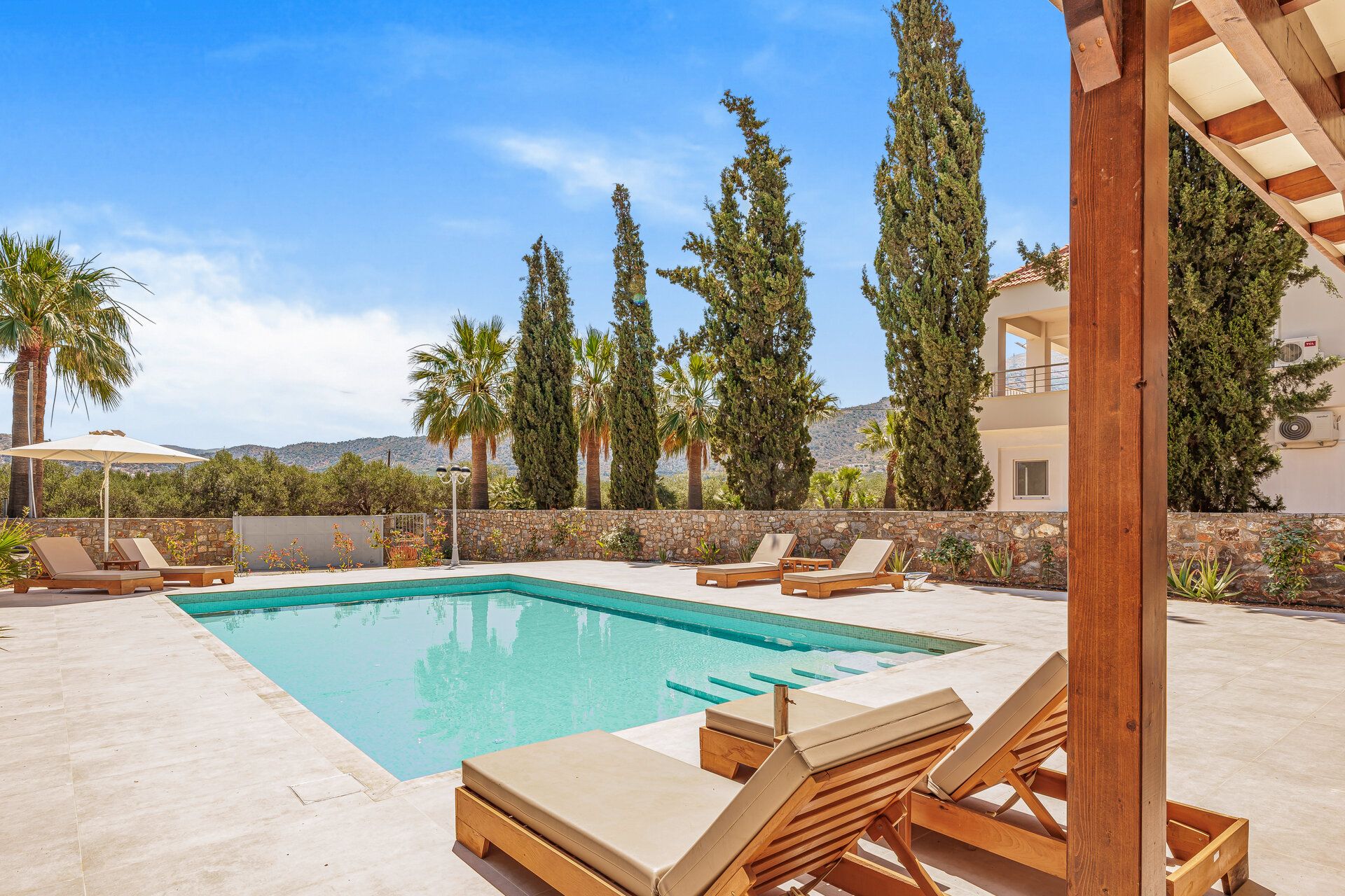 Villa Hera pool with loungers